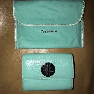 Authentic Tiffany & Co. turnlock leather wallet